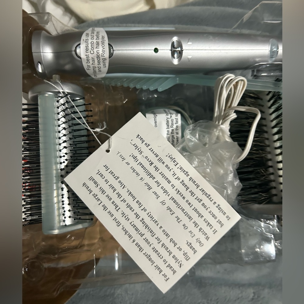Revo chargeable portable curling and blowdry brush